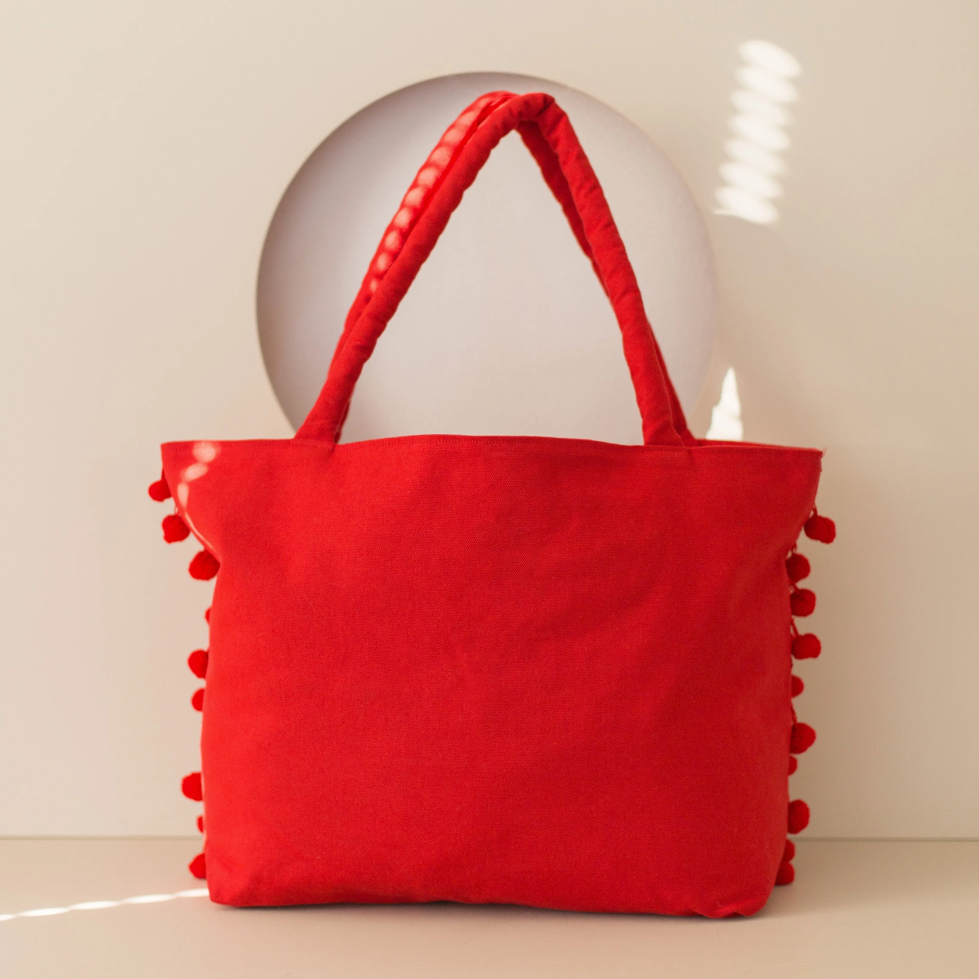 Ha Leh Pom Pom Tote Bag in Red